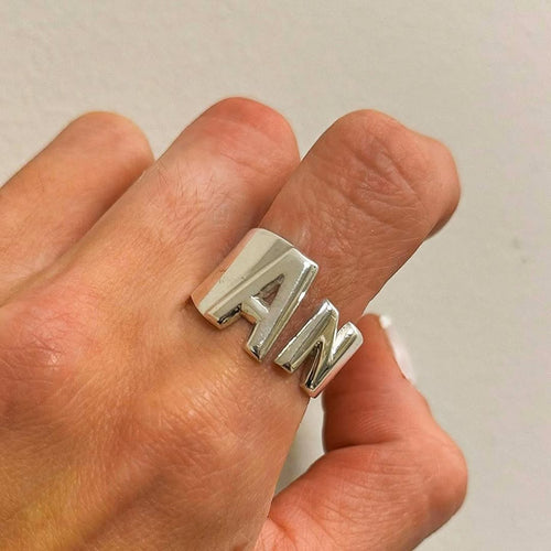 Anillos con inicial abierto adelante